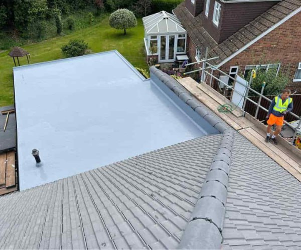 This is a photo of a newly installed hip roof, with a combined liquid covered flat roof. Work carried out by SM Roofing Hatfield