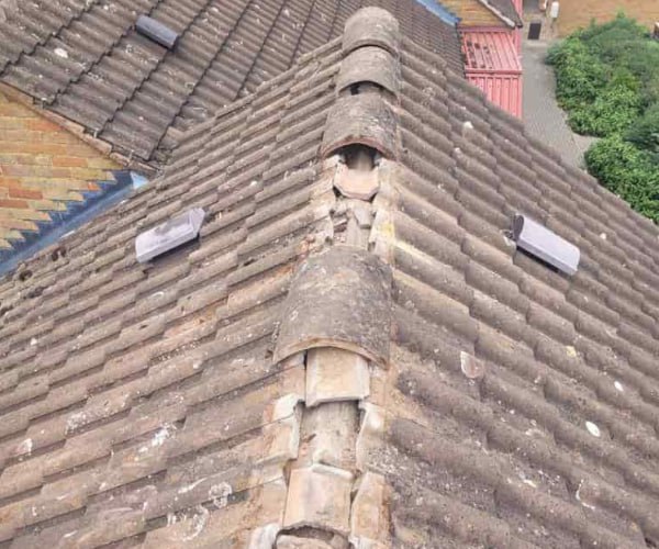 This is a photo if a roof ridge which has missing tiles. The ridge tiles are being replaced by SM Roofing Hatfield